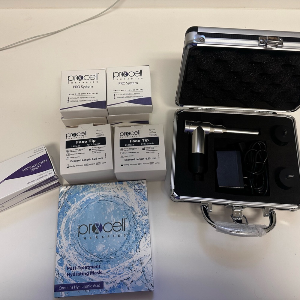 Silver and Black Skincare Device